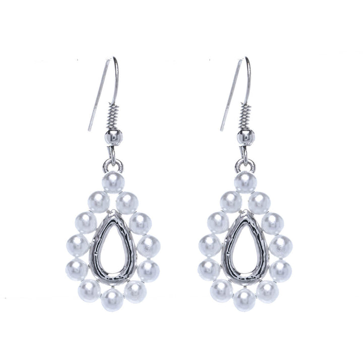 Hanging teardrop shaped pearl earrings