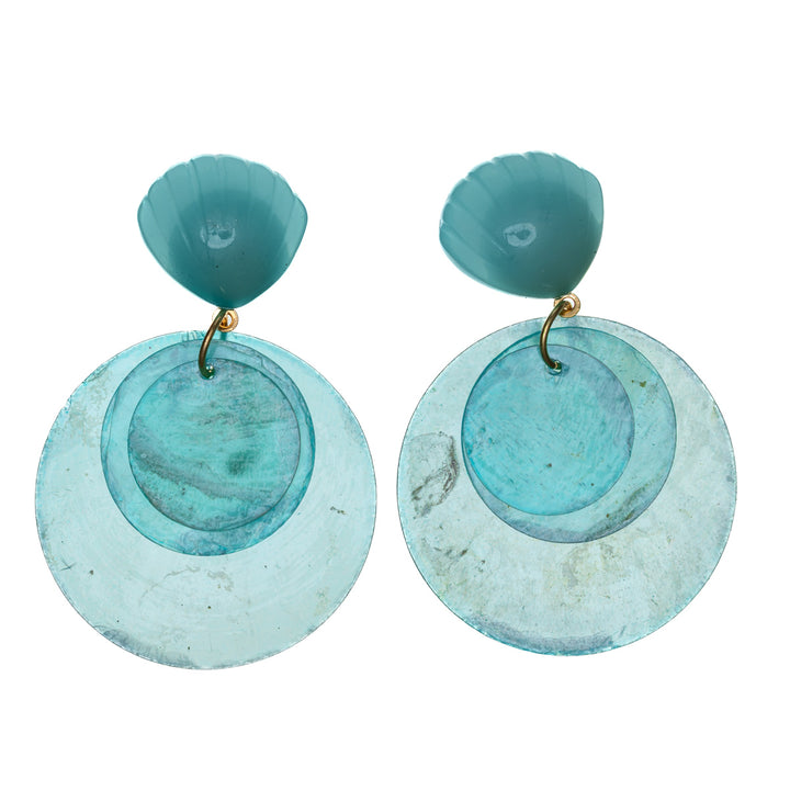 Hängande hockeyörhängen med snäckskal