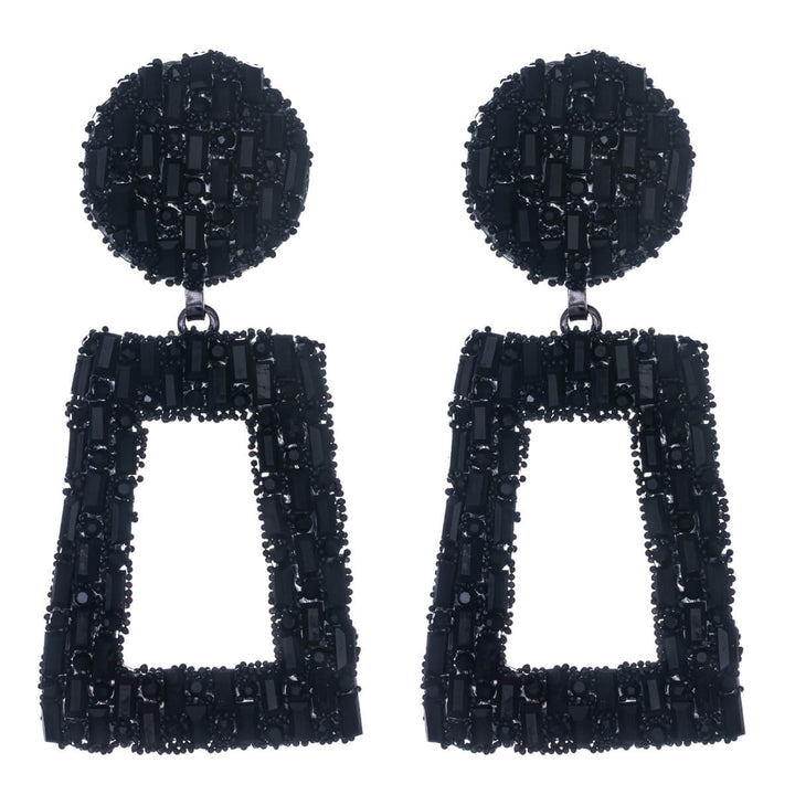 Stora, glittrande, kantiga dinglande örhängen