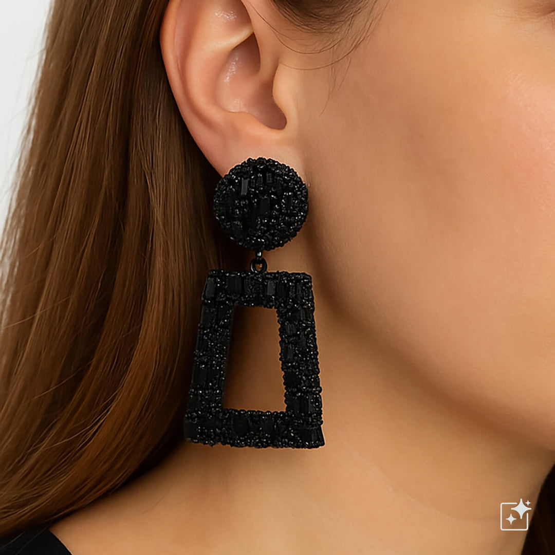 Stora, glittrande, kantiga dinglande örhängen