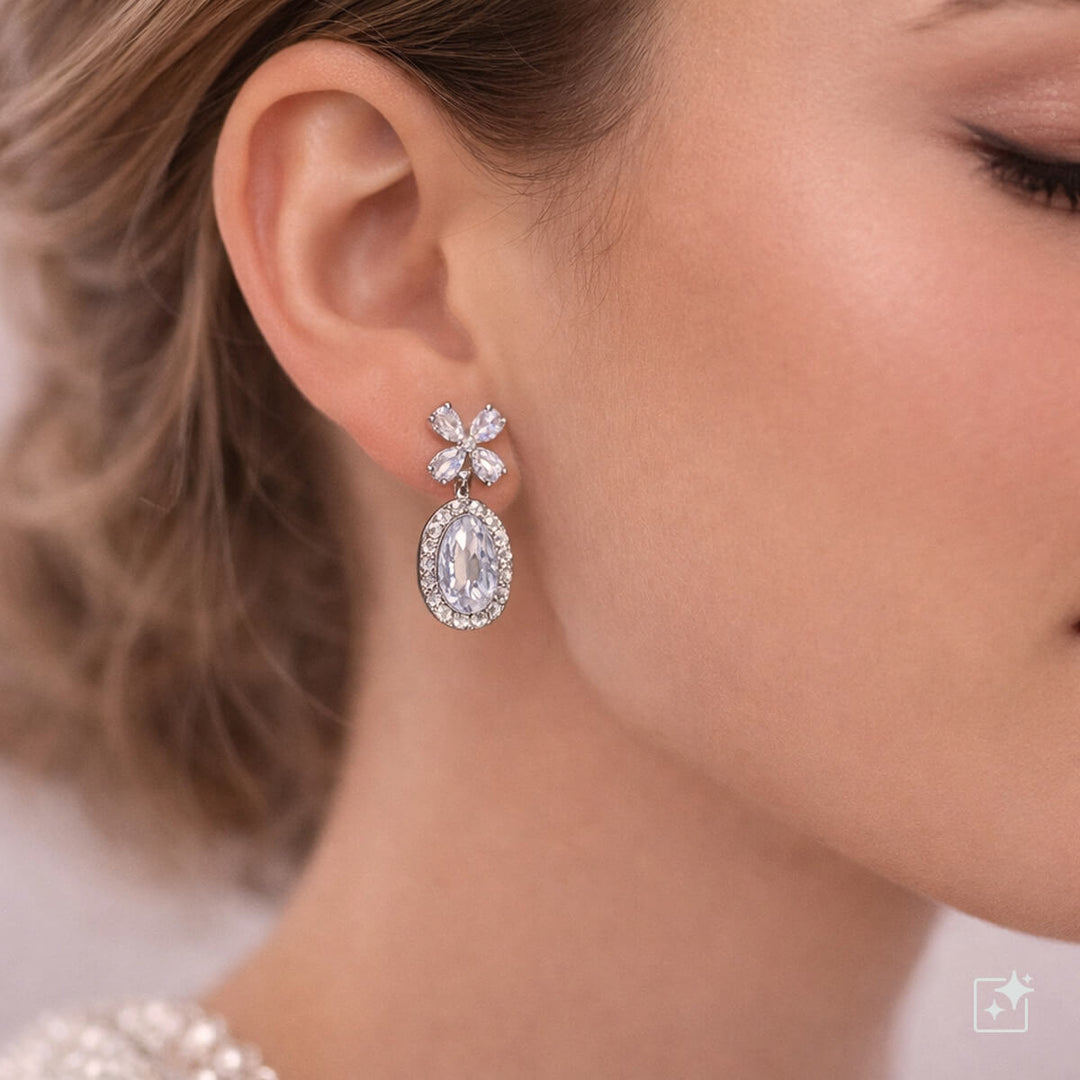Delicate teardrop-shaped zirconia party earrings with flower top