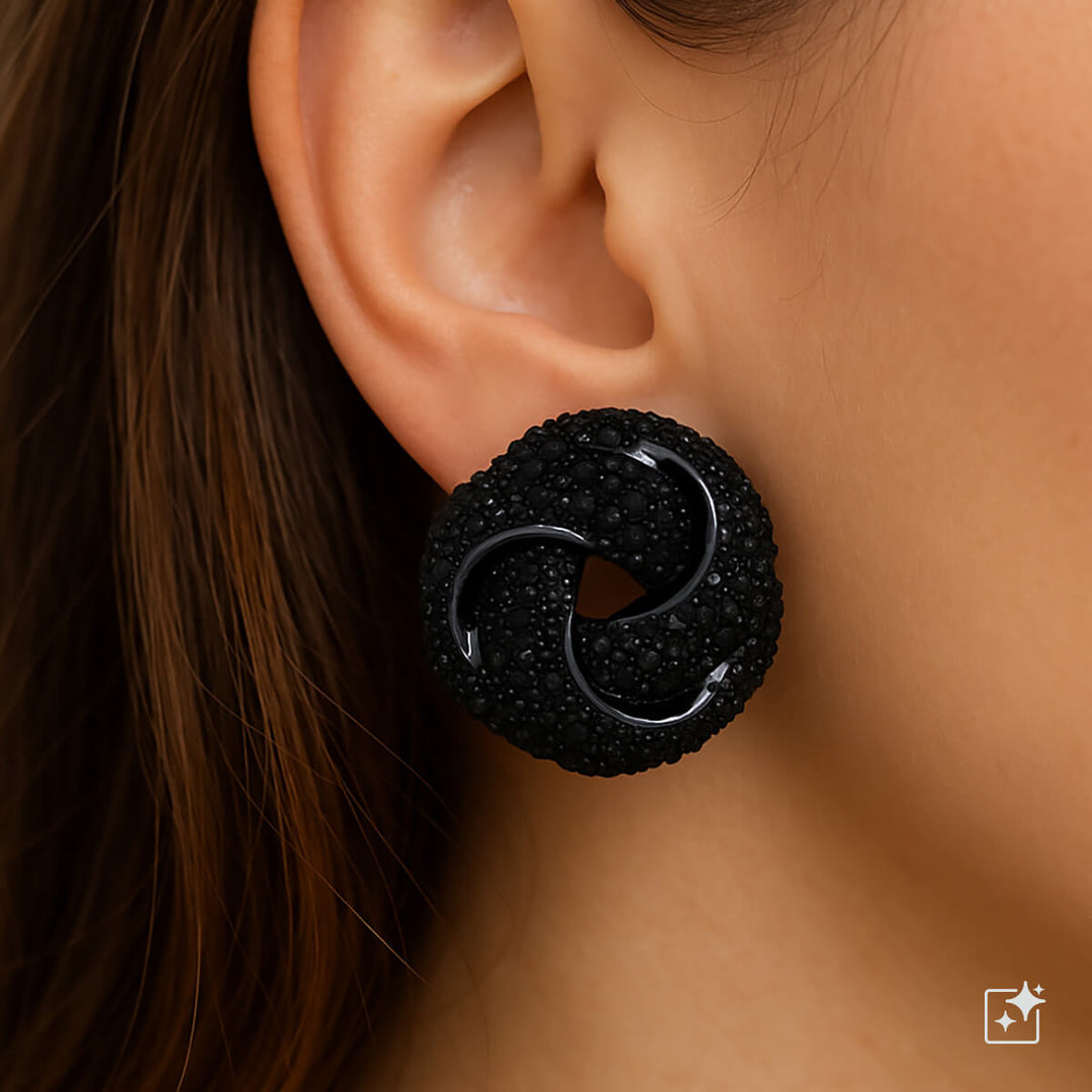 Large sparkling knot earrings