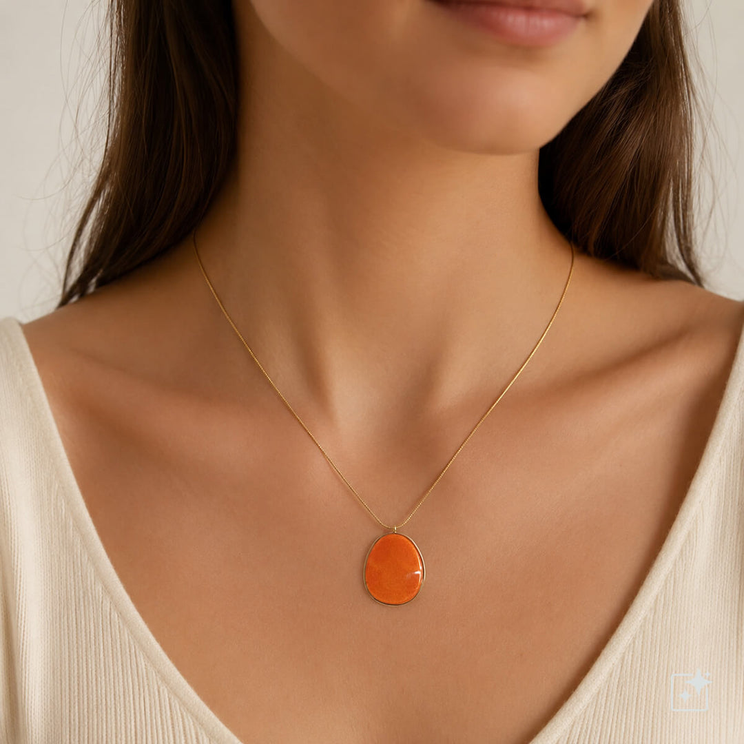 Halsband i guldpläterat stål med orange hänge (stål 316L)