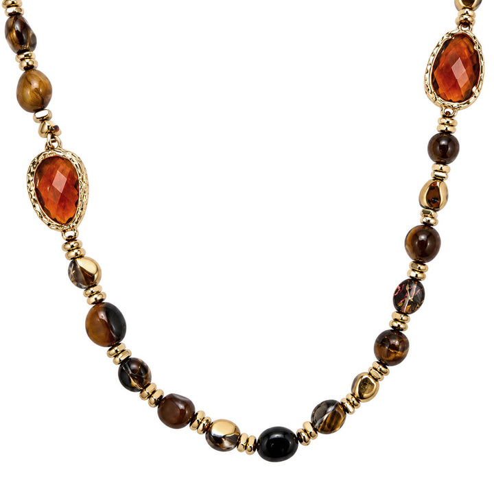 Details of the long brown necklaces