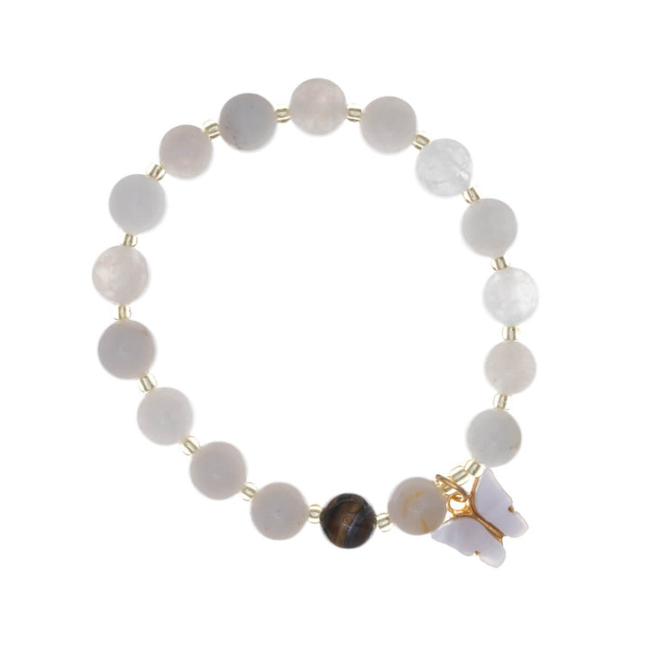 Armband med stenpärlor och fjärilshänge