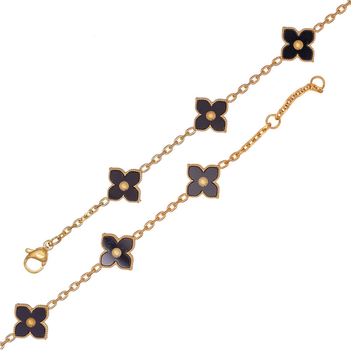 Delikat armband med fyrklöver i svart finish (PVD-guldpläterat stål)