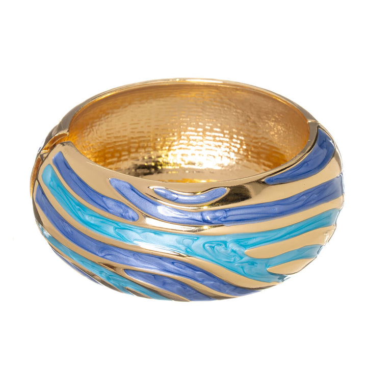 Wide, adjustable bracelet with a colorful pattern