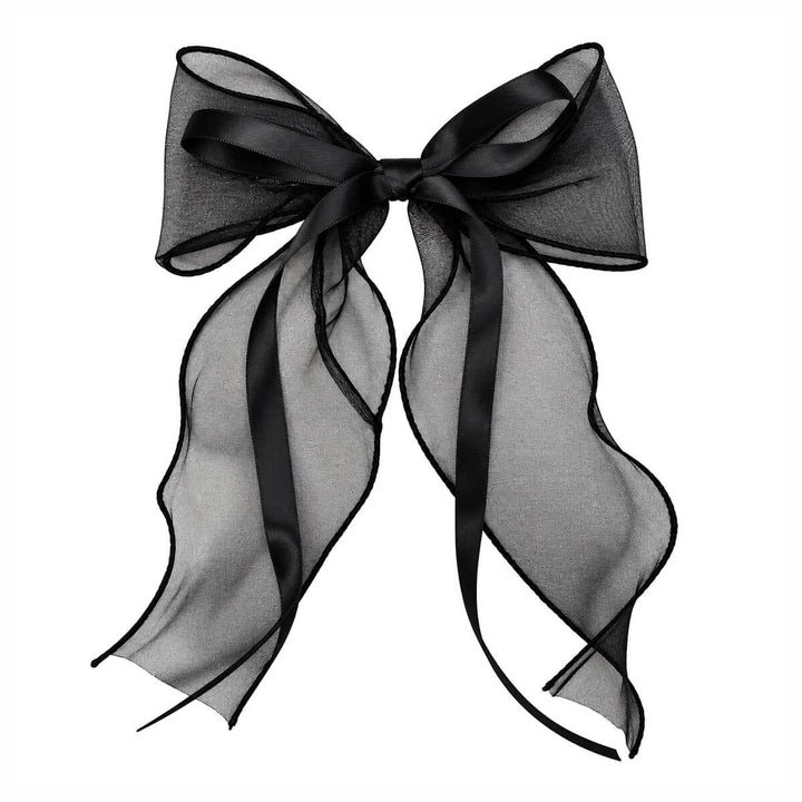 Lightweight, lace-like hair bow with a clasp