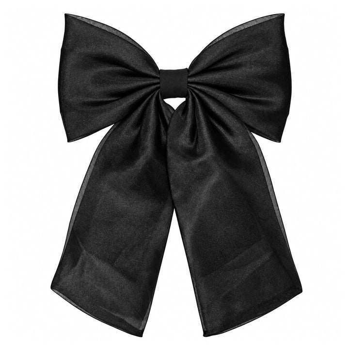 A sleek, lace-like hair bow with a clasp