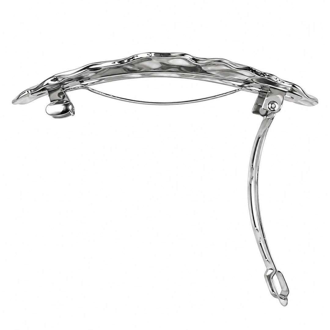 Curved, oval-shaped hair clip—hand-forged with a shiny finish