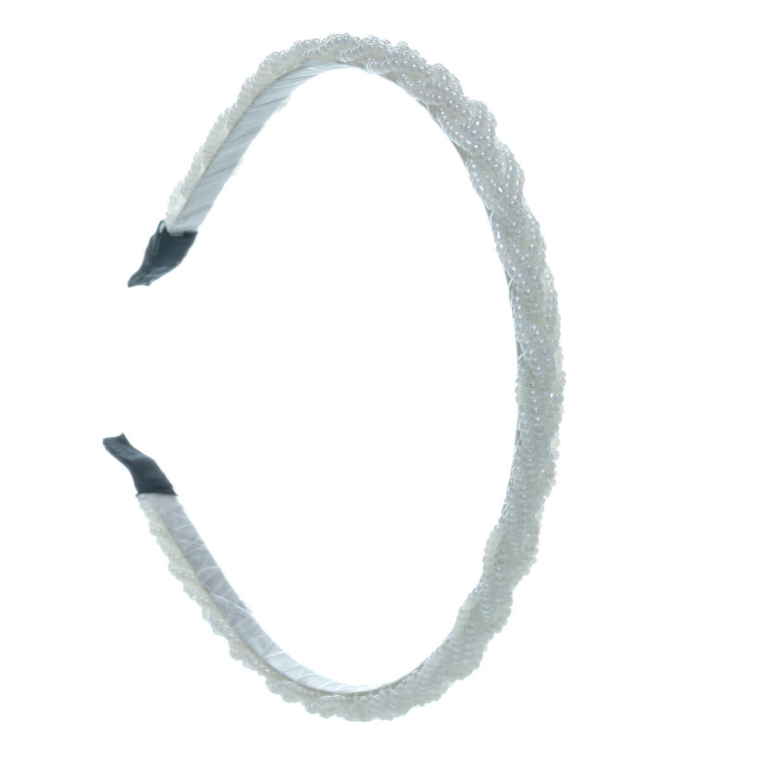 Smalt hårband flätat med pärlor