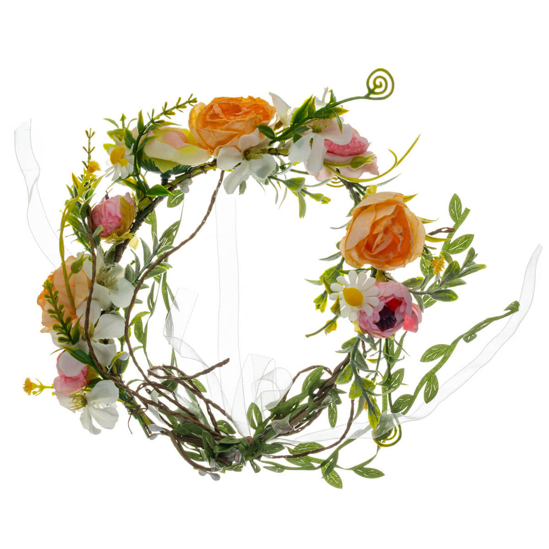 En krans av persikrosa ängsblommor