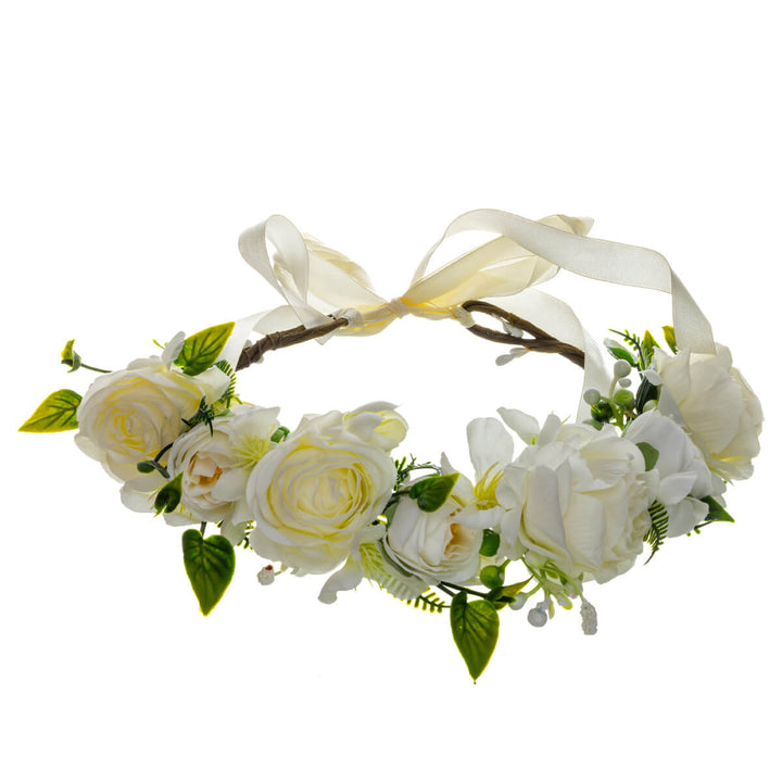 Vit blomsterkrans med rosor
