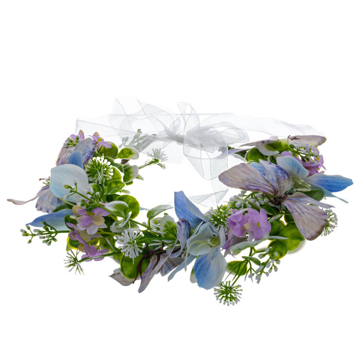 Ljusblå-lila krans av fjärilsblommor