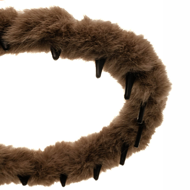 Hårband i plast med dekoration av fuskpäls