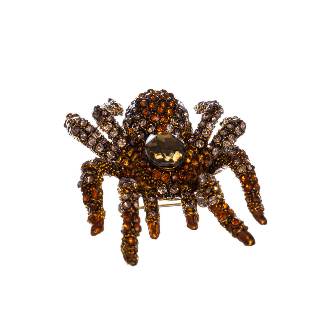 Sparkling spider brooch with glass stones