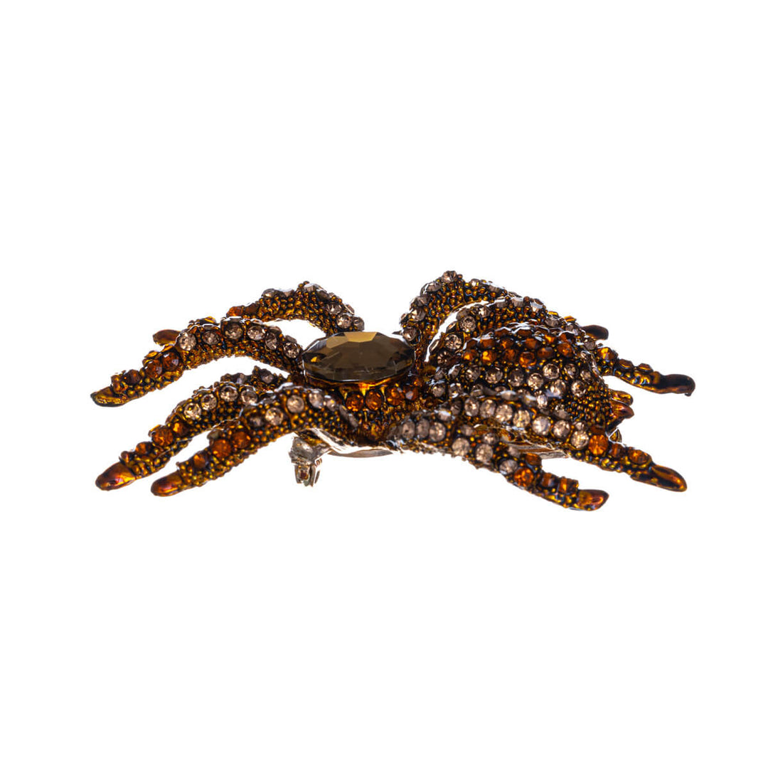 Sparkling spider brooch with glass stones