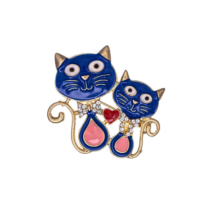 Two cats brooch