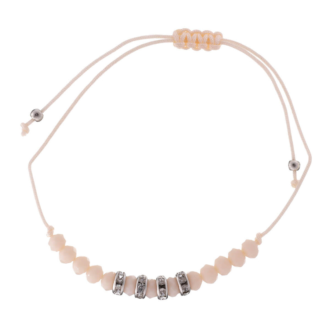 Ett tunt armband med glaspärlor