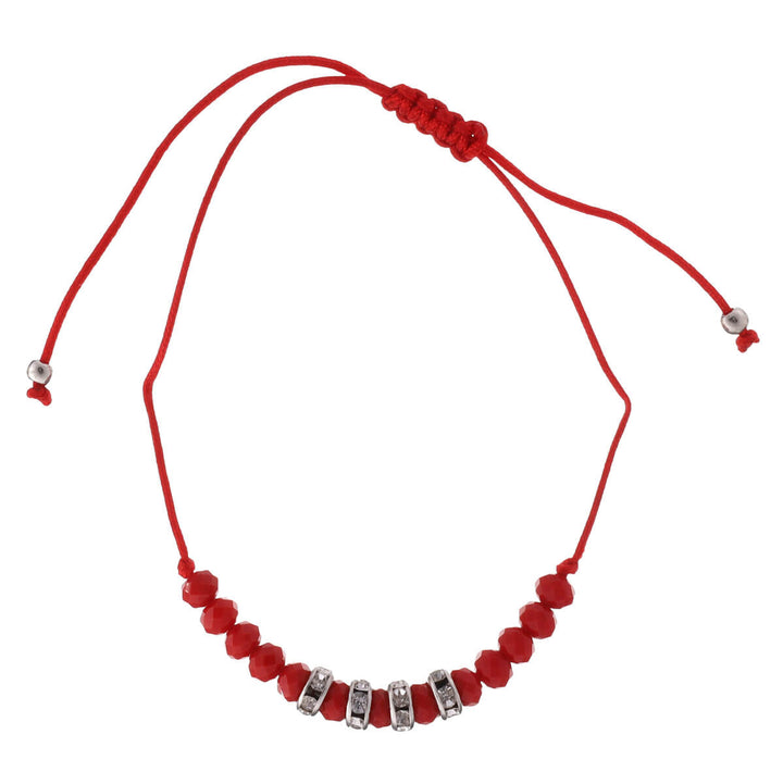 Ett tunt armband med glaspärlor