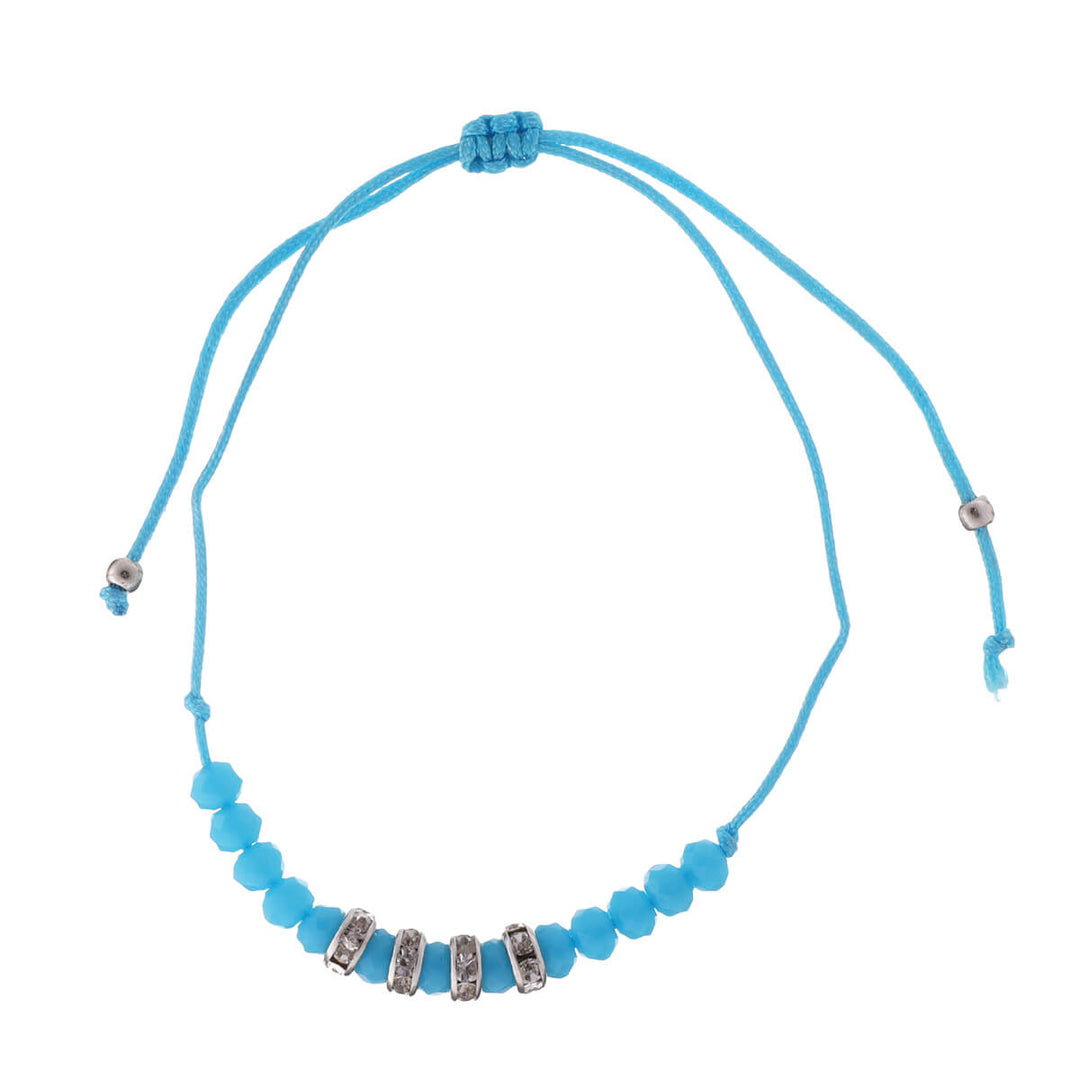 Ett tunt armband med glaspärlor