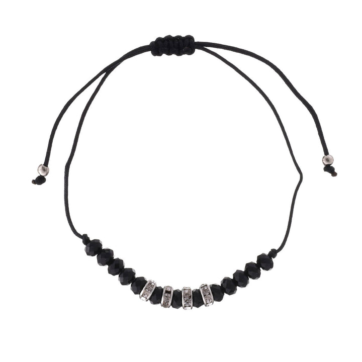 Ett tunt armband med glaspärlor