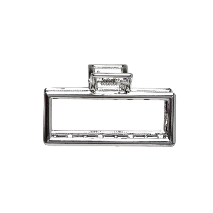 En liten rektangel av metallisk hajtandklipp 4,5 cm