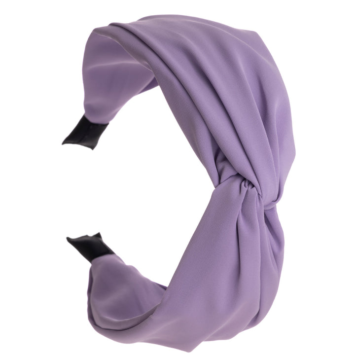 A node strap on a wide hairstyle