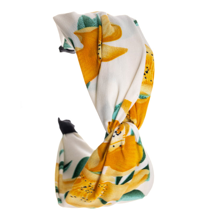 En blomma mönstrad bred hårkrage