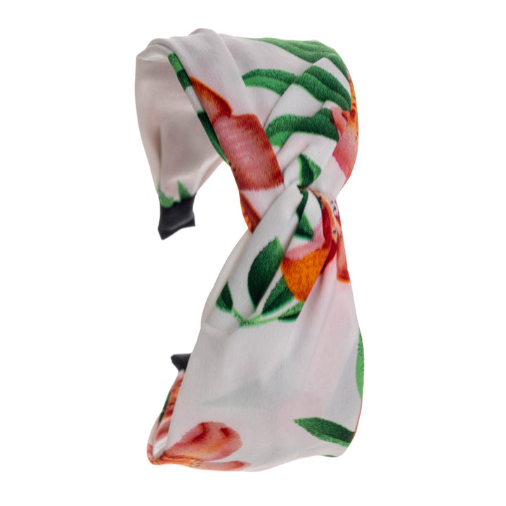 En blomma mönstrad bred hårkrage