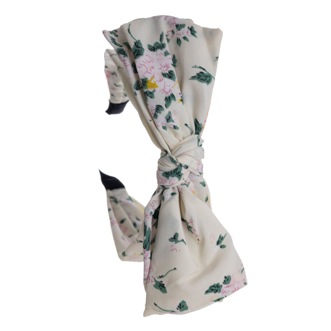 A wide banter of a hairstyle