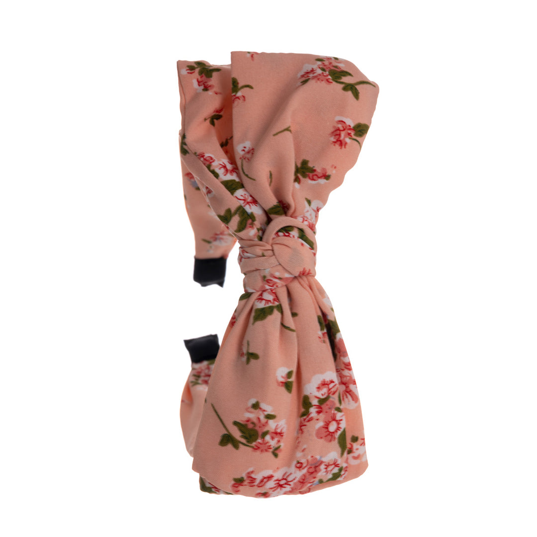 A wide banter of a hairstyle