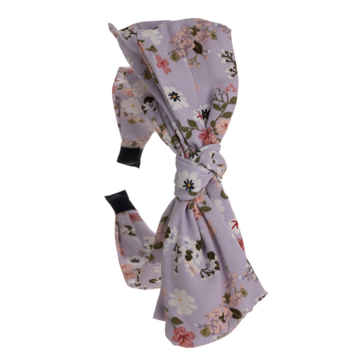 A wide banter of a hairstyle