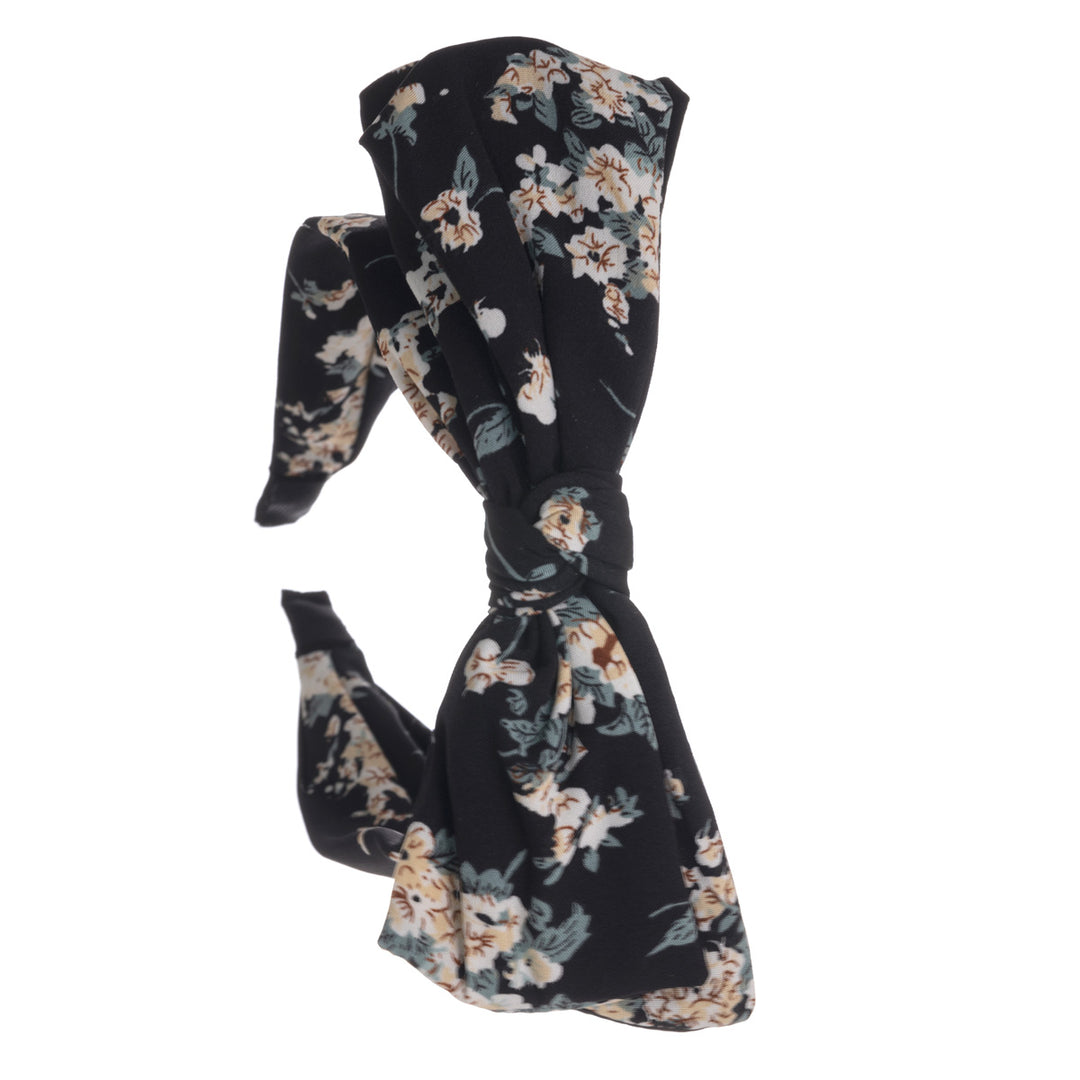 A wide banter of a hairstyle