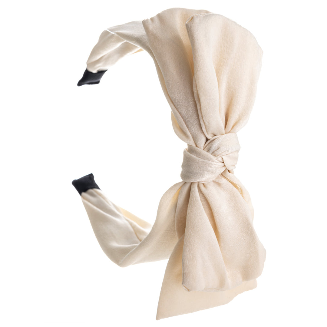 A wide banter of a hairstyle