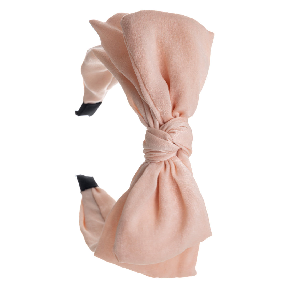 A wide banter of a hairstyle