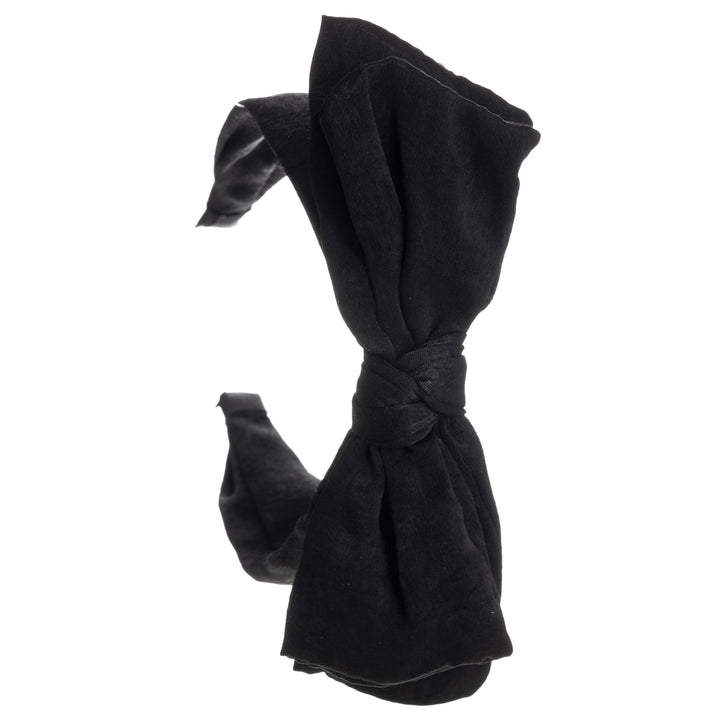 A wide banter of a hairstyle