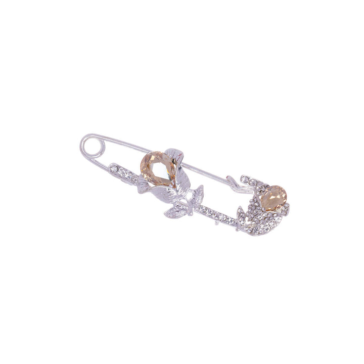 A glittering rhinestone hook -up brooch